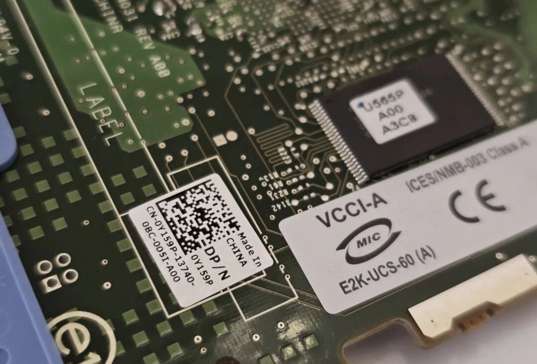 Close-up of a circuit board with electronic components and labels.