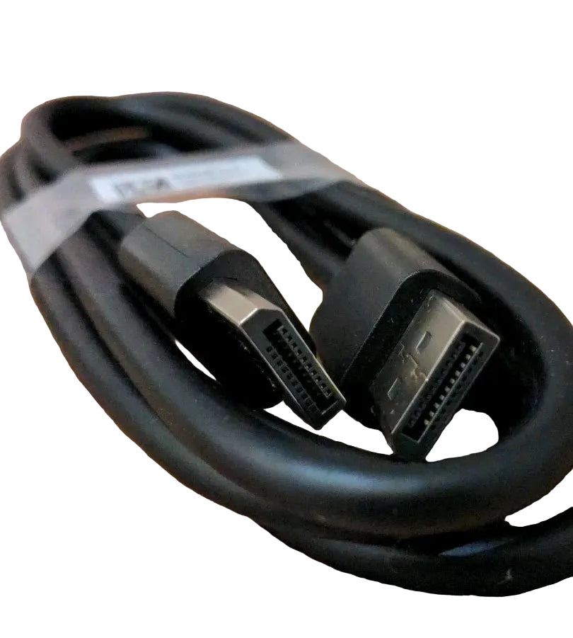 Coiled HDMI cable on a wooden surface