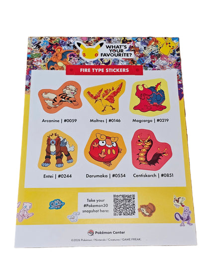 Sheet of colorful stickers on a wooden surface