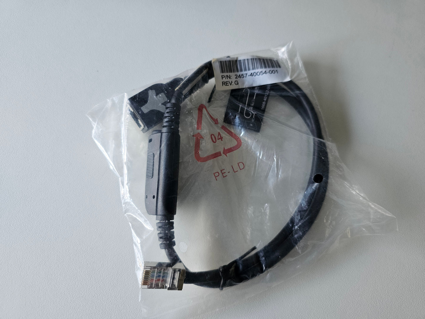 Cable with a label on a white background