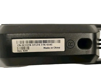 Back view of a device with a label and certification logo on a light gray background
