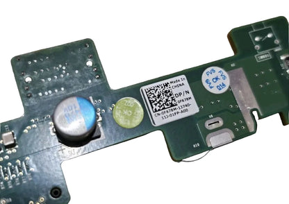 Close-up of a circuit board with a QR code label on a black background