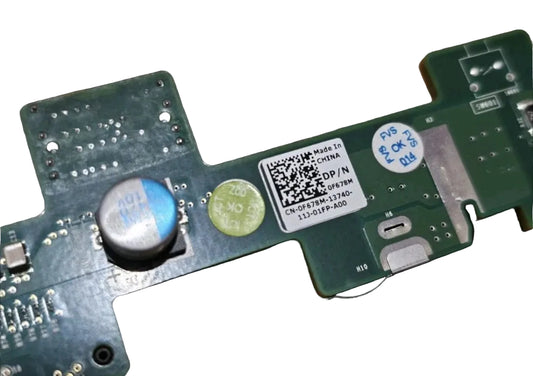 Close-up of a circuit board with a QR code label on a black background