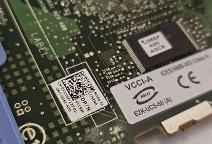Close-up of a circuit board with electronic components and labels.