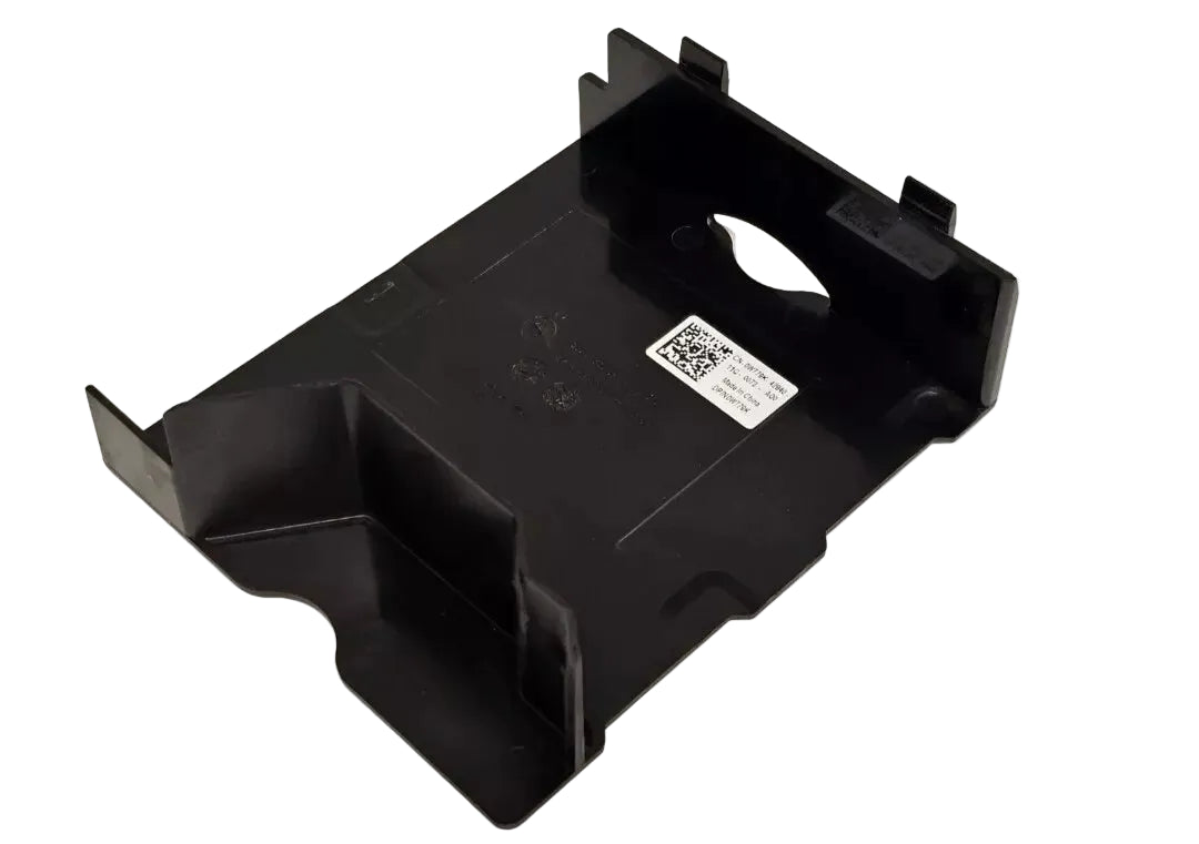 Black plastic component with a QR code on a beige background