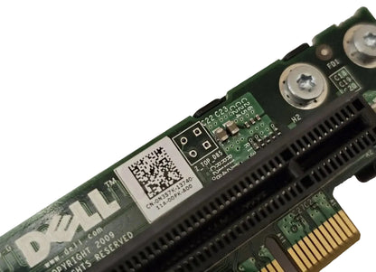 Close-up of a Dell computer component with a QR code label on a white background